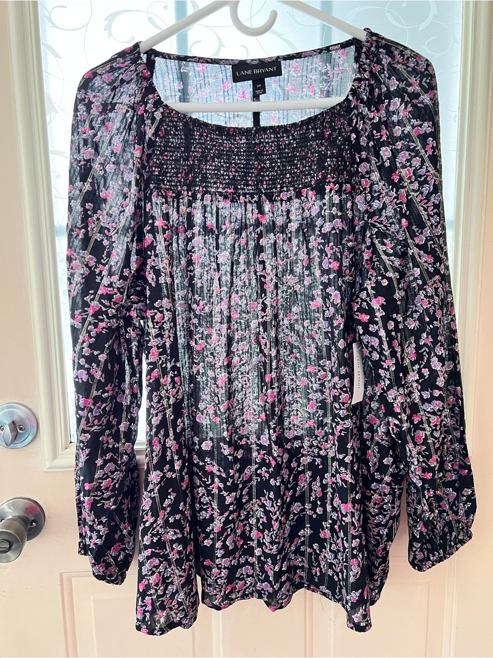 Lane Bryant Black Floral half sheer pullover blouse with smocked chest panel.